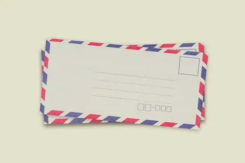 Stack of vintage air mail envelopes isolated on a white background. Foto stock