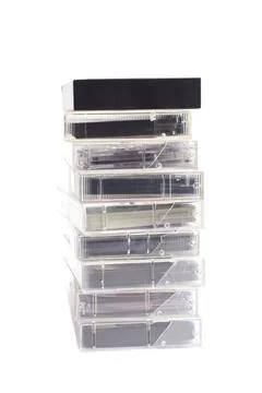 Stack of vintage audio cassettes isolated on white. Foto stock