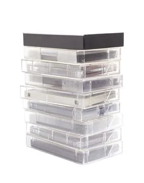 Stack of vintage audio cassettes isolated on white. Stock Photos