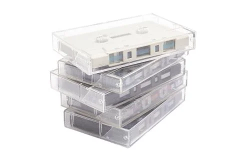 Stack of vintage audio cassettes isolated on white. Foto stock