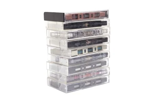 Stack of vintage audio cassettes isolated on white. 写真素材