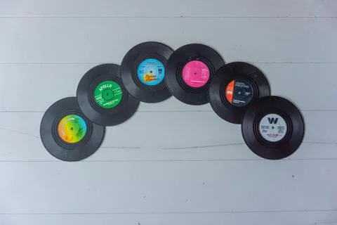 A stack of vintage colorful LP's Stock Photos