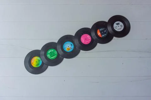 A stack of vintage colorful LP's Stock Photos