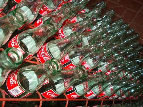 A stack of vintage glass Coca-Cola bottles at the Biedenharn Coca-Cola Museum Fotos Stock