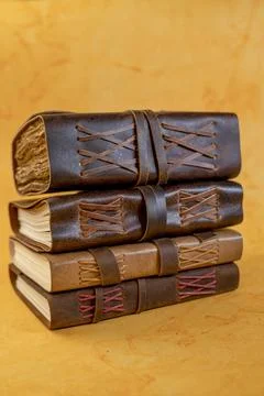 Stack of vintage journals in different size and background Stock Photos
