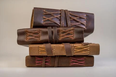 Stack of vintage journals in different size and background Stock Photos