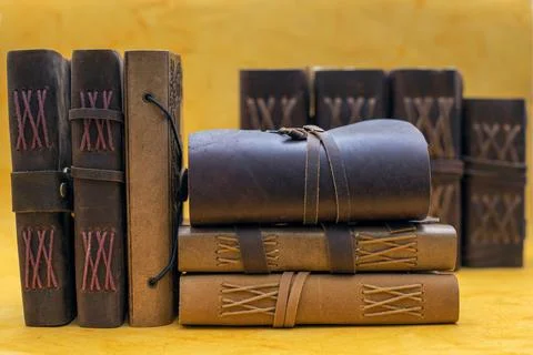 Stack of vintage journals in different size and background Stock Photos