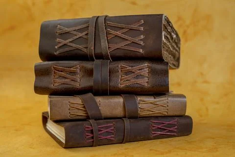 Stack of vintage journals in different size and background Stock Photos