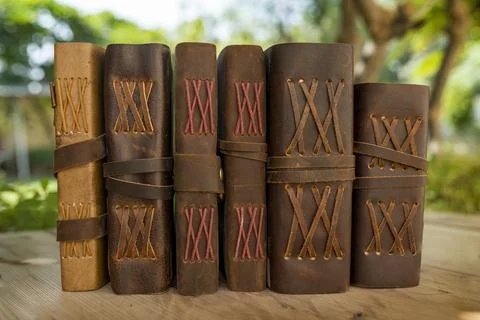 Stack of vintage journals in different size and background Stock Photos