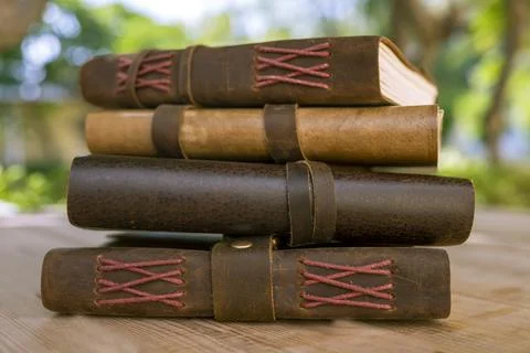 Stack of vintage journals in different size and background Stock Photos