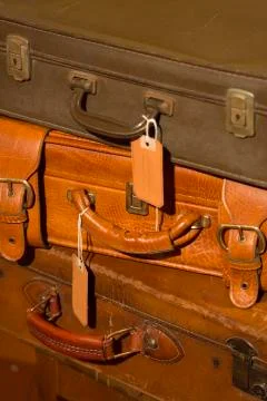Stack of vintage leather suitcases Stock Photos