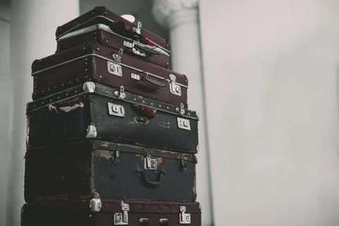 Stack Of Vintage Suitcases . background with large stack of antique suitcases Stock Photos