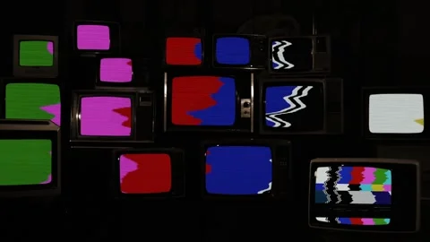 Stack Of Vintage Televisions With Static Noise And Color Bars, Distorted Signal Stock Footage 114209711