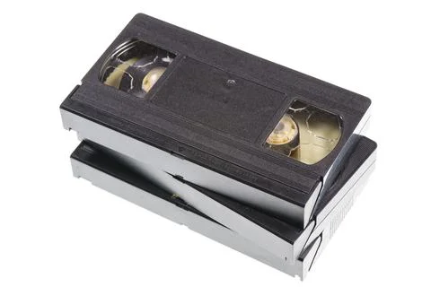 A stack of vintage VHS tapes isolated on white background Stock Photos
