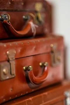 Stack of vintage worn suitcases Stock Photos