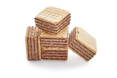Stack of wafer biscuits cubes isolated on white background. Stock Photos