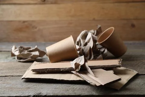 Stack of waste paper on wooden table Stockfoto's