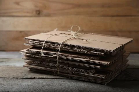 Stack of waste paper on wooden table 스톡 사진
