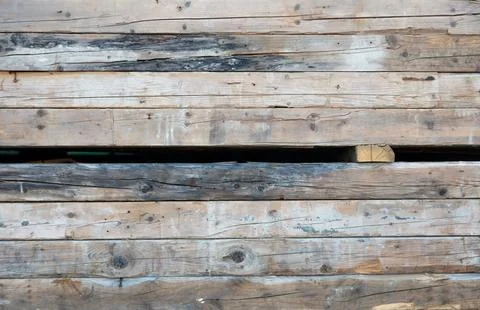 Stack of weathered rough wooden planks, rustic reclaimed timber wall texture Stock Photos
