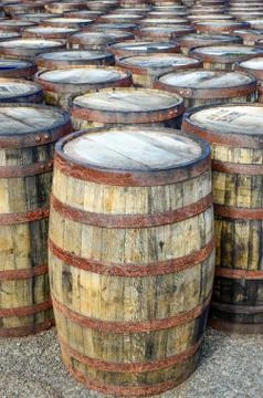 Stack of whisky casks and barrels Stock Photos