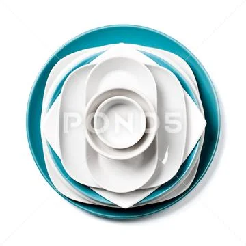 A stack of white and blue porcelain utensils on a clean white background.. Stock Photos