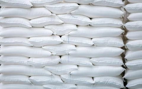 Stack of white bag in the warehouse Stock Photos