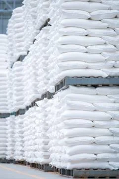 Stack of white bag in the warehouse Stock Photos
