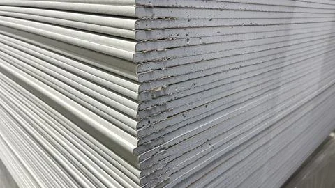 A stack of white boards with a gray stripe down the middle. The boards are stack Stock Photos