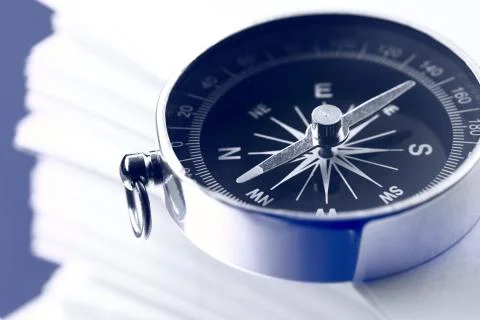 Stack of white cards and compass 스톡 사진