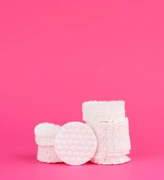 Stack of white cotton round discs for cosmetic procedures Stock Photos
