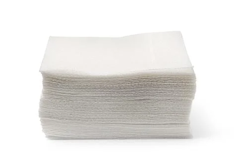 Stack of white disposable paper napkins creating hygiene concept Stock Photos