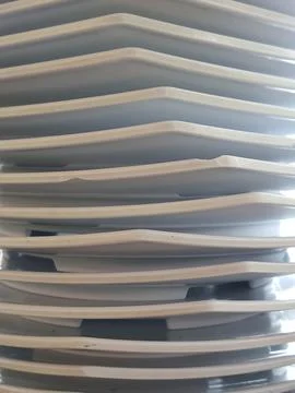 This is a stack of white melamine plates in a square shape, Stock Photos