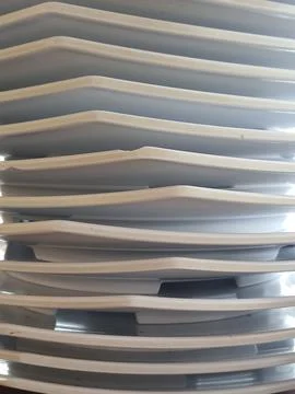 This is a stack of white melamine plates in a square shape, Stock Photos