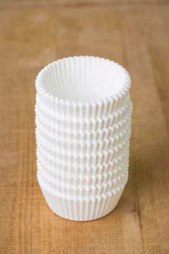 A stack of white muffin cases Stockfoto's