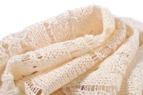 Stack of white openwork knitted fabric Stock Photos