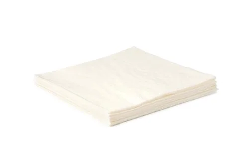 Stack of white paper napkins on white background Stockfoto's