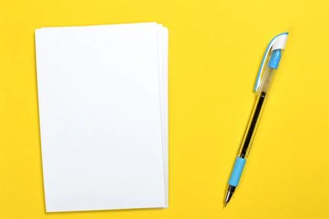 Stack of white paper with a pen Stock Photos