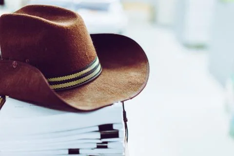 Stack of white paper placed in office and caps. Stock Photos