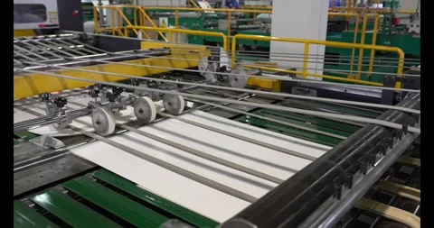 Stack of white papers is on a conveyor belt. Stock Footage 333980453