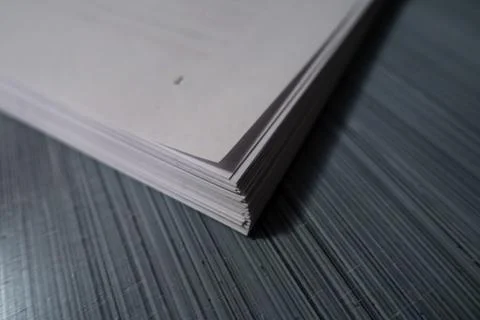A stack of white papers Фото