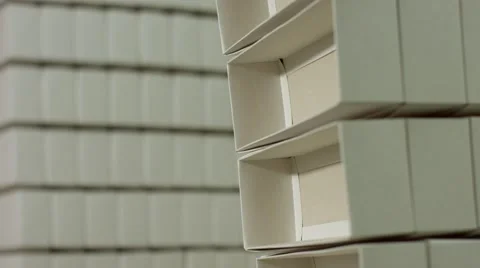 Stack of white rectangular boxes. Vídeo Stock 63175909