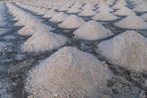 Stack of white salt piles Stock Photos