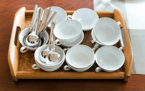 Stack of White Soup Bowls and Spoons Stock Photos
