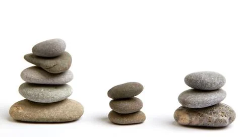 Stack of white stones balancing Stock Photos