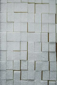 Stack of white sugar cubes food concept Stockfoto's