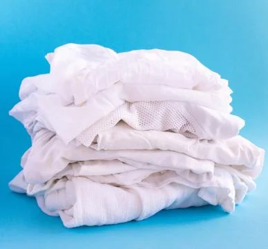 A stack of white summer clothes Stock Photos
