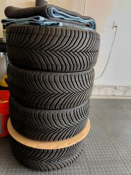 Stack of Winter Tires in Storage Room 스톡 사진