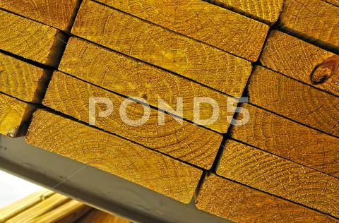 Stack of wood to be used on a home Stock Photos
