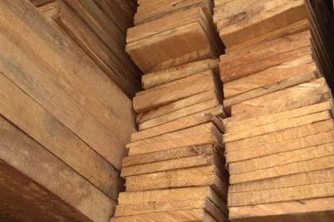 A stack of wood beam and raw wooden plank Stock Photos