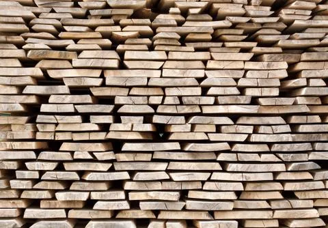 Stack of wood planks for construction buildings and furniture production Stock Photos